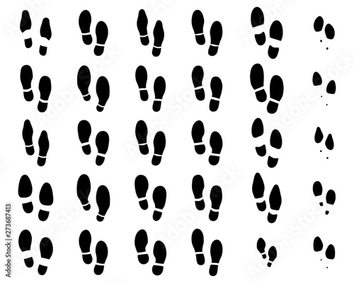 Black prints of shoes on a white background
