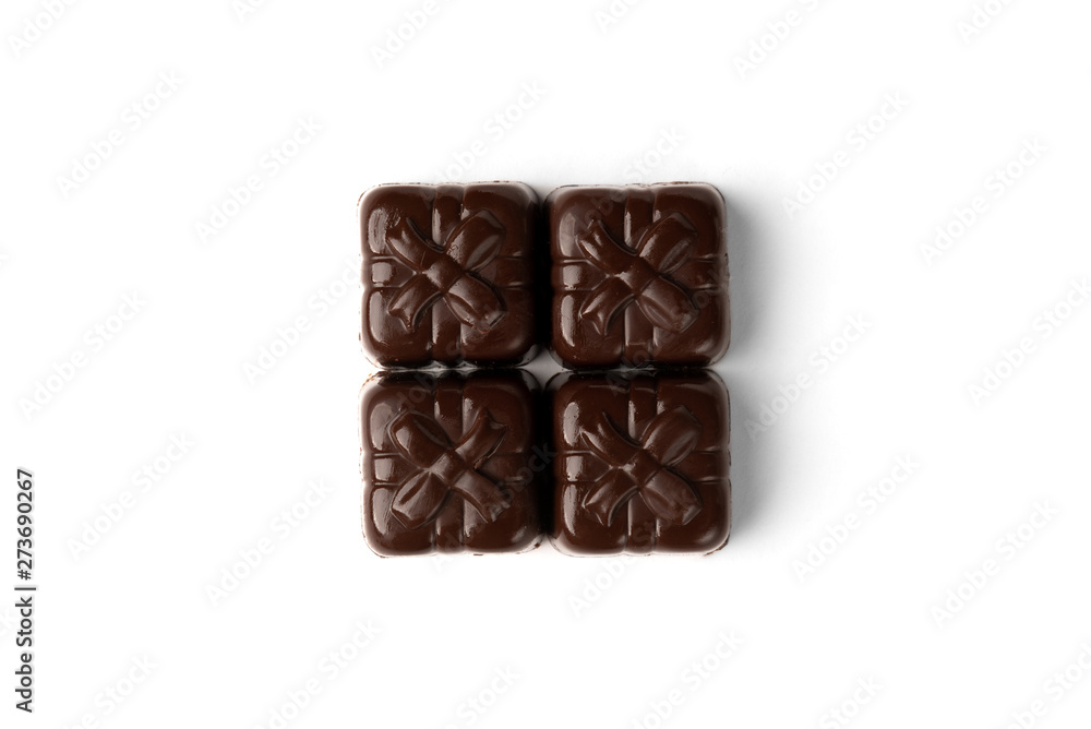 Chocolate sweets in heart shape isolated on white background. Chocolate sweets in heart shape isolated on white background.