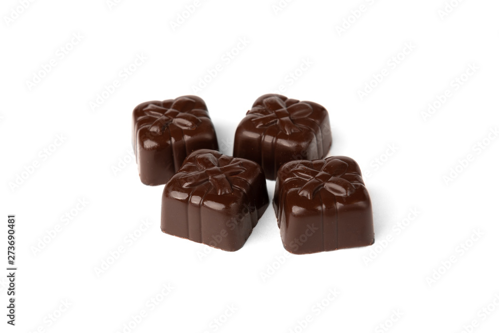 Chocolate sweets in heart shape isolated on white background. Chocolate sweets in heart shape isolated on white background.