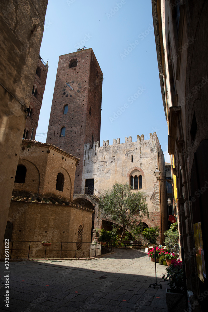 Baptistry, Palazzo Vecchio and civic tower, Albenga, Italy.
