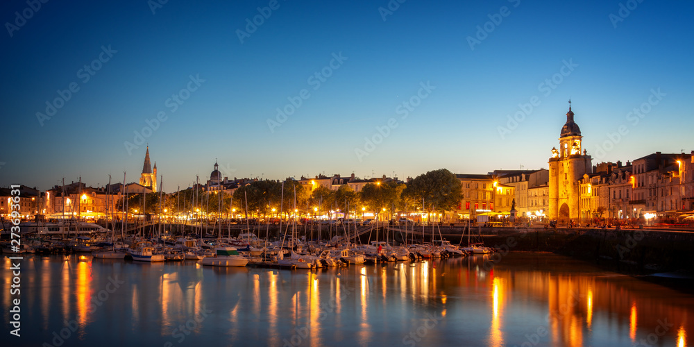 Old harbor of La Rochelle, France at night