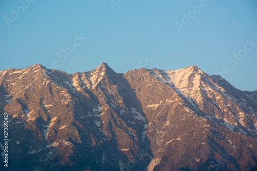 A beautiful view of the Dhauladhar Himalayan Range at Sunset at Kareri, Himachal Pradesh, India