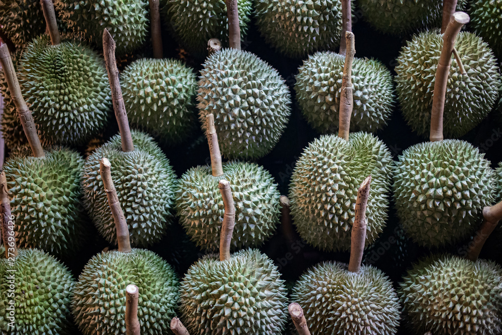 Durian displaying on stall for sell at night market Durian displaying on stall for sell at night market