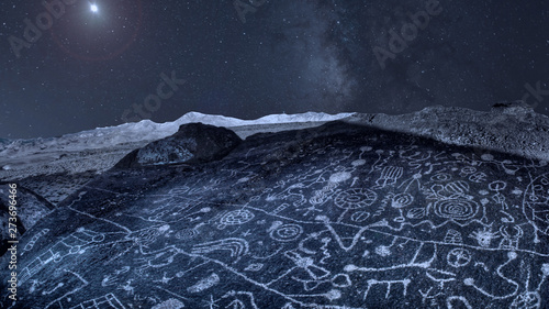 Night Sky over Ancient Petroglyphs in Eastern Sierra Nevada Mountains California photo