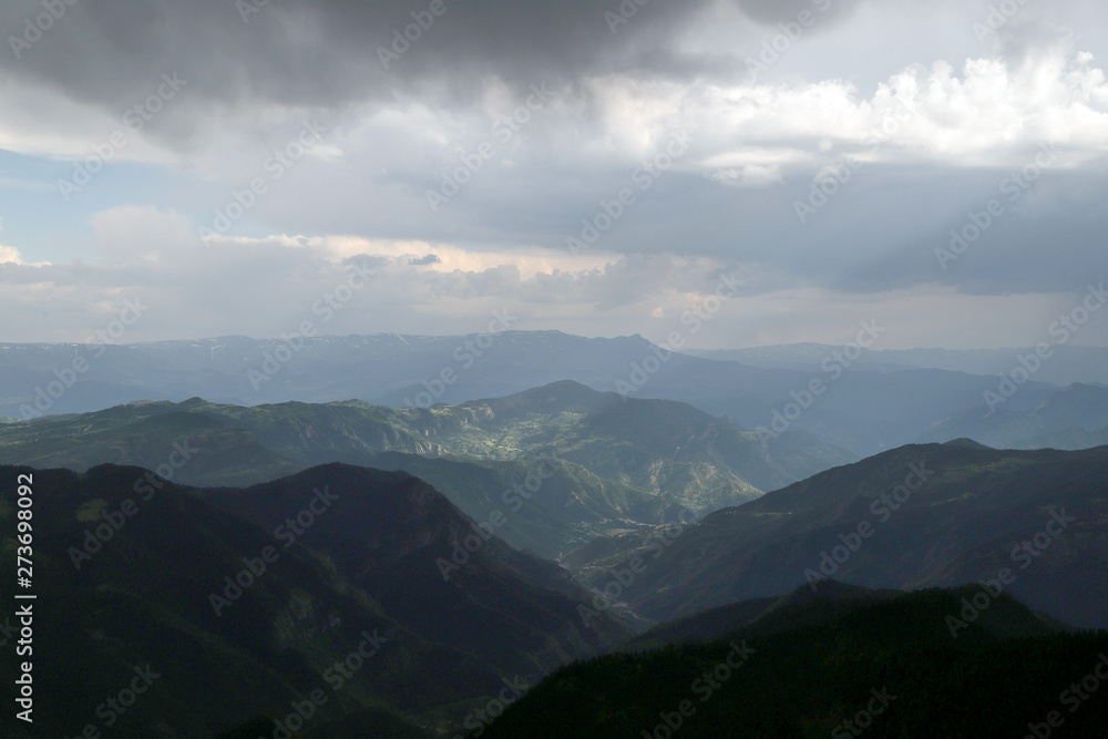 beautiful dark blue mountain landscape with fog and forest.artvin/turkey beautiful dark blue mountain landscape with fog and forest.artvin/turkey