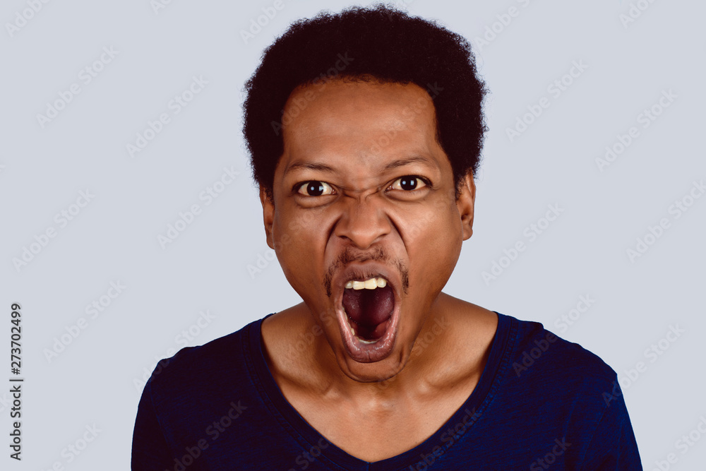 Portrait of Afro American screaming. Portrait of Afro American screaming.