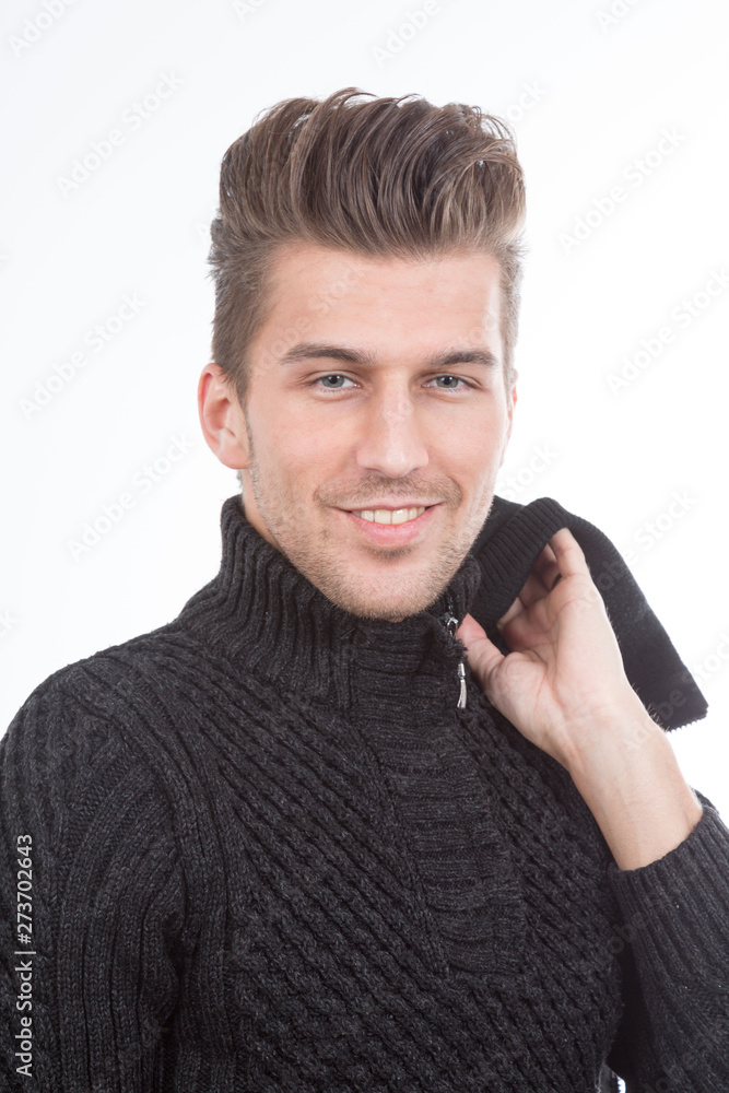 self confident young handsome man in black sweater self confident young handsome man in black sweater