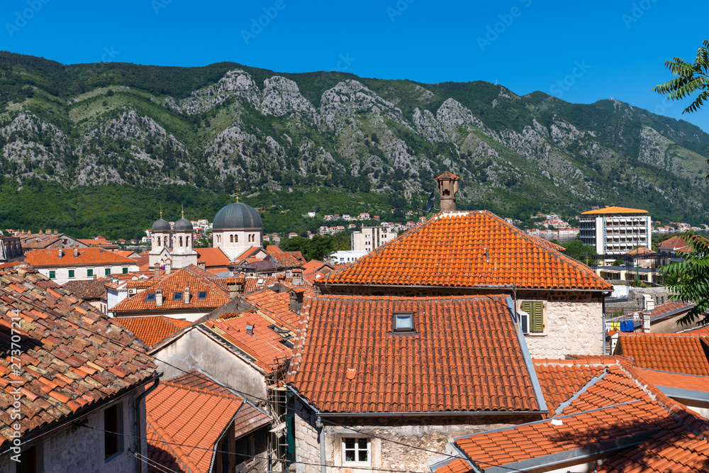 Red tiled roofs of old town houses in Kotor, Montenegro
