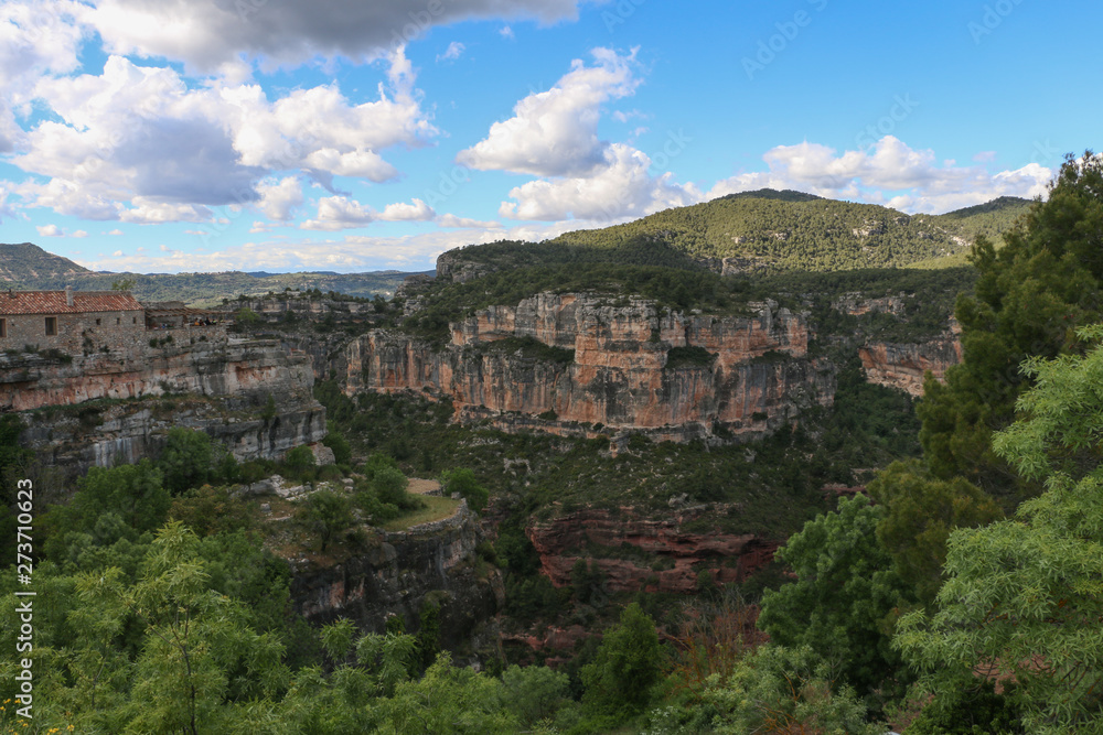 Mountain rocks and clouds