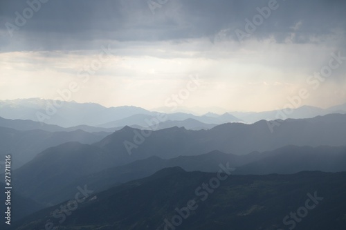 beautiful dark blue mountain landscape with fog and forest.artvin/turkey © murat