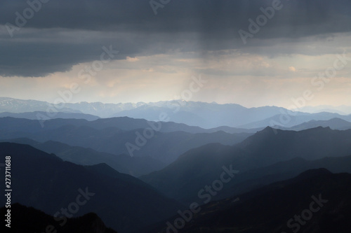 beautiful dark blue mountain landscape with fog and forest.artvin/turkey