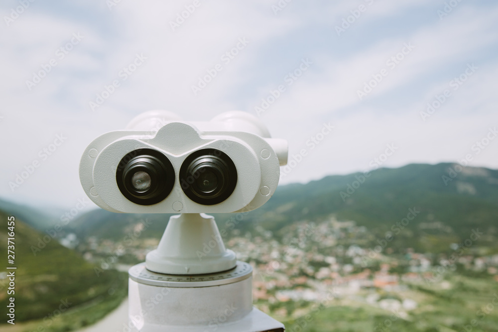 Look through the tourist binoculars at Georgian city Mtskheta