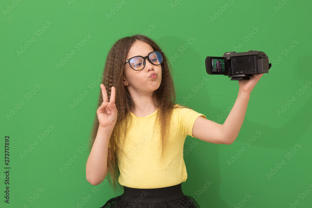 little girl shoots herself on video camera, child blogger little girl shoots herself on video camera, child blogger