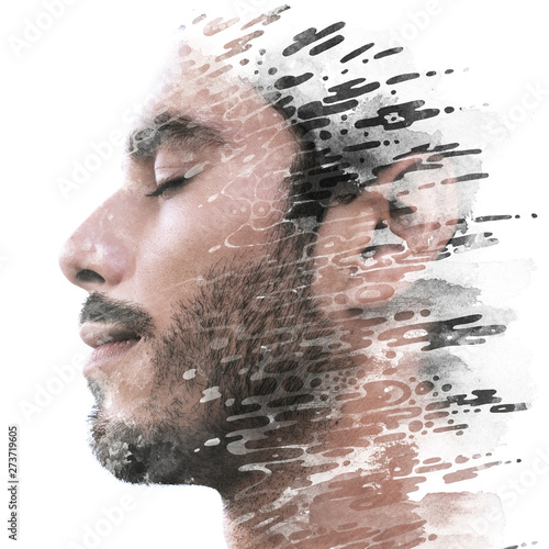 Paintography. Double exposure of a young male model combined with hand drawn painting of dissolving ink texture