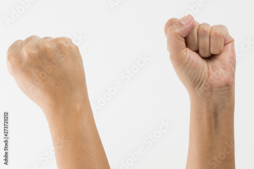 Close-up of a woman's hand and finger on white background