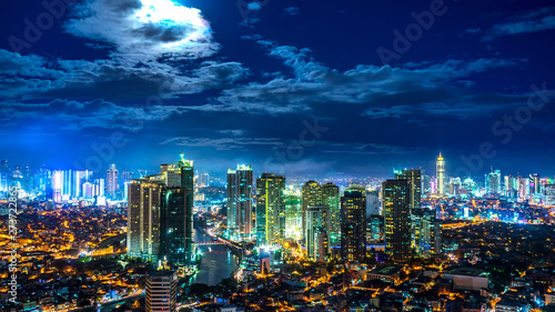 Rising Moon over the skyline of Metro Manila photo
