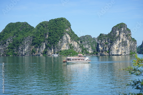VIETNAM HANOI Halong Bay 2019 YEAR, Beautiful scenic view on a foggy cloudy day of the cruises in Halong Bay. It is a beautiful natural wonder in northern Vietnam near the Chinese border, on