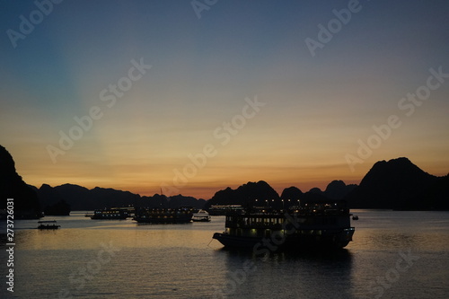 VIETNAM HANOI Halong Bay 2019 YEAR, Beautiful scenic view on a foggy cloudy day of the cruises in Halong Bay. It is a beautiful natural wonder in northern Vietnam near the Chinese border, on