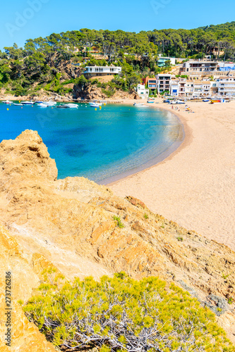 Picturesque bay with rocks on beach in Sa Riera village, Costa Brava, Spain