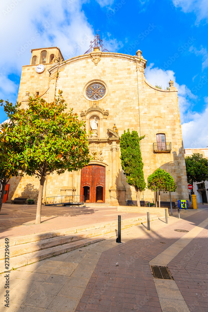 Facade of old church in Tossa de Mar town, Costa Brava, Spain