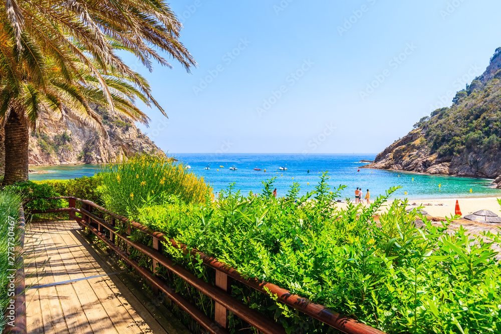 Coastal walkway in Cala Giverola, most beautiful beach on Costa Brava, Spain