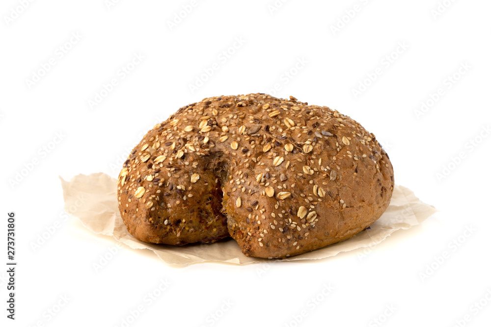 Baked bread on a white background. Homemade bread close up. Baked bread on a white background. Homemade bread close up.