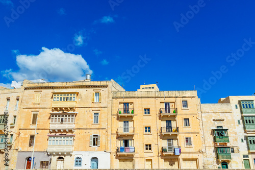 Maltese streets and colorful wooden balconies in Valletta, Malta