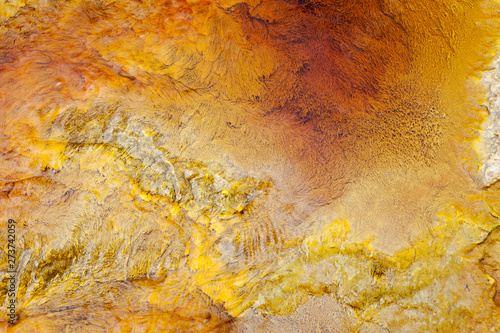 From above beautiful orange streams and transitions on rock in Mines of Riotinto Huelva