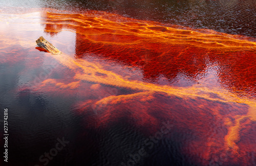 From above beautiful orange streams and transitions on rock in Mines of Riotinto Huelva photo