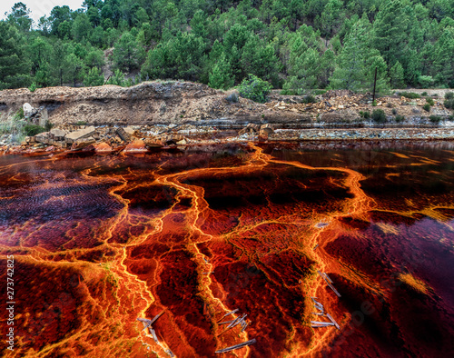 From above beautiful orange streams and transitions on rock in Mines of Riotinto Huelva photo