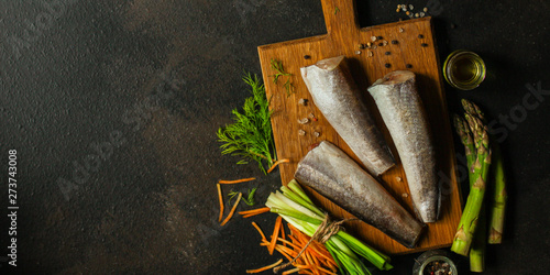 fish raw hake (set of ingredients for cooking). food background. top view. copy space