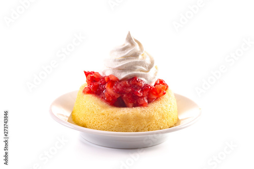 Fototapeta A Single Serve Strawberry Shortcakes with Strawberry Sauce and Whipped Cream