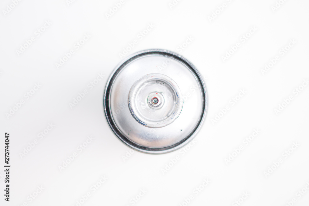 aerosol paint top view close-up blurred white background chrome aerosol paint top view close-up blurred white background chrome