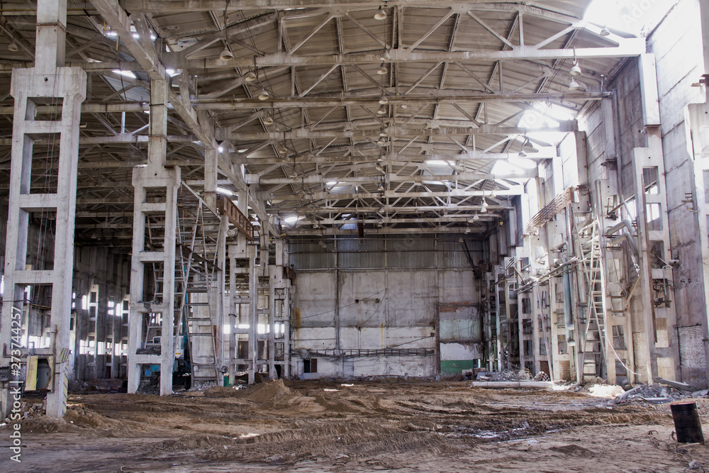  Old industrial building. Abandoned production. Demolition work of an old industrial building.