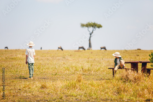 Kids witnessing great migration in Kenya © BlueOrange Studio