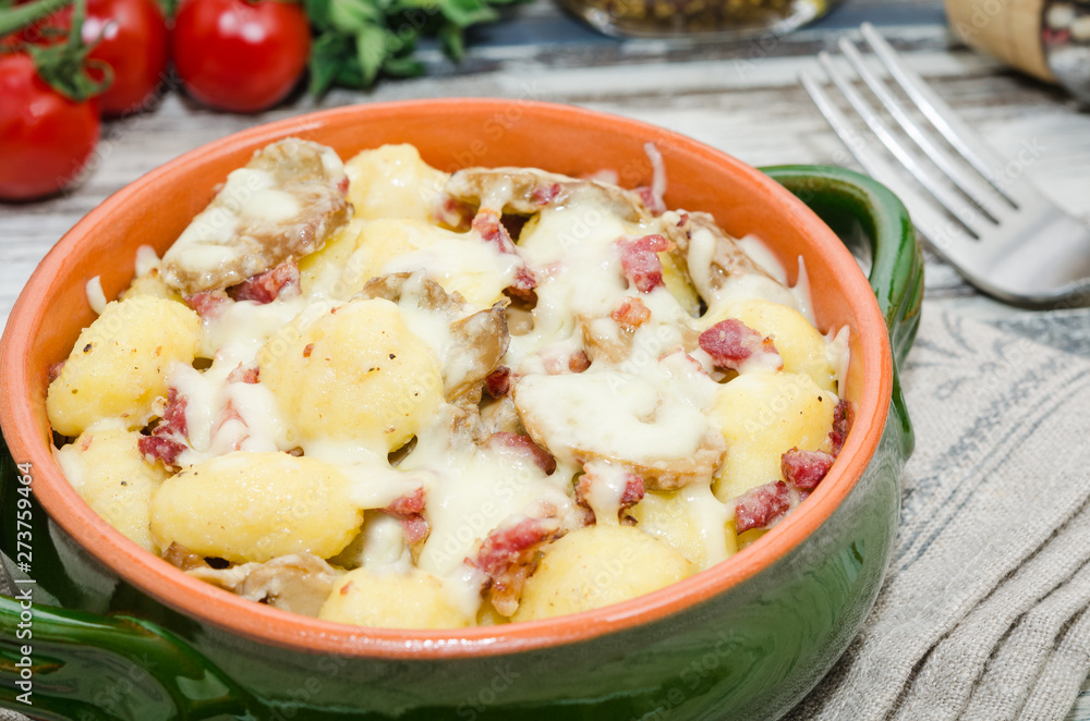 Gnocchi. Roasted gnocchi with bacon and mushrooms. Gnocchi. Roasted gnocchi with bacon and mushrooms.