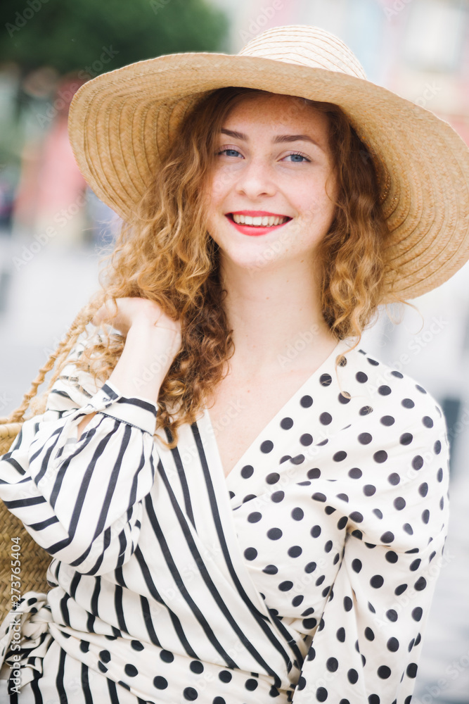 Young caucasian teenager with hat, traveling and loving the french riviera and nice city, fresh face, clean blurred backgorund.