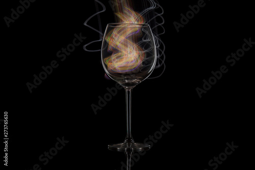 Wine glass on a black isolated background