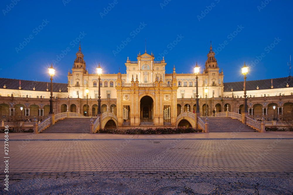 Main facade of the monument in the Plaza de España in Seville in the blue hour