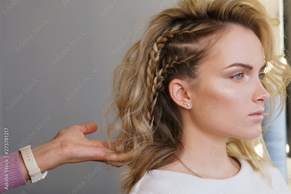 Creation of evening hairstyles fashionable stylish women's hairstyles. Hair styling process. Courses in hairdressing. Training hairdressing. Brading hair. Open workshop master class of hairdressing Stock Photo | Adobe Stock Creation of evening hairstyles fashionable stylish women's hairstyles. Hair styling process. Courses in hairdressing. Training hairdressing. Brading hair. Open workshop master class of hairdressing Stock Photo | Adobe Stock