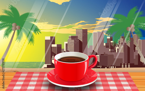 red coffee cup on the wooden table on the beach