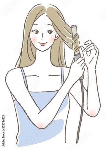 コテを使う女性