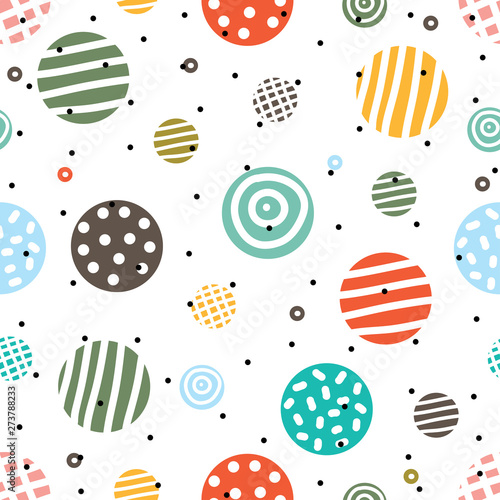 Decorative abstract polka dots in the style of the 60s.. Cheerful polka dot vector seamless pattern. Can be used in textile industry, paper, background, scrapbooking.