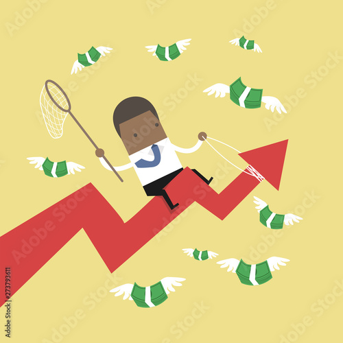 African businessman riding success arrow graph trying to catch money fly.