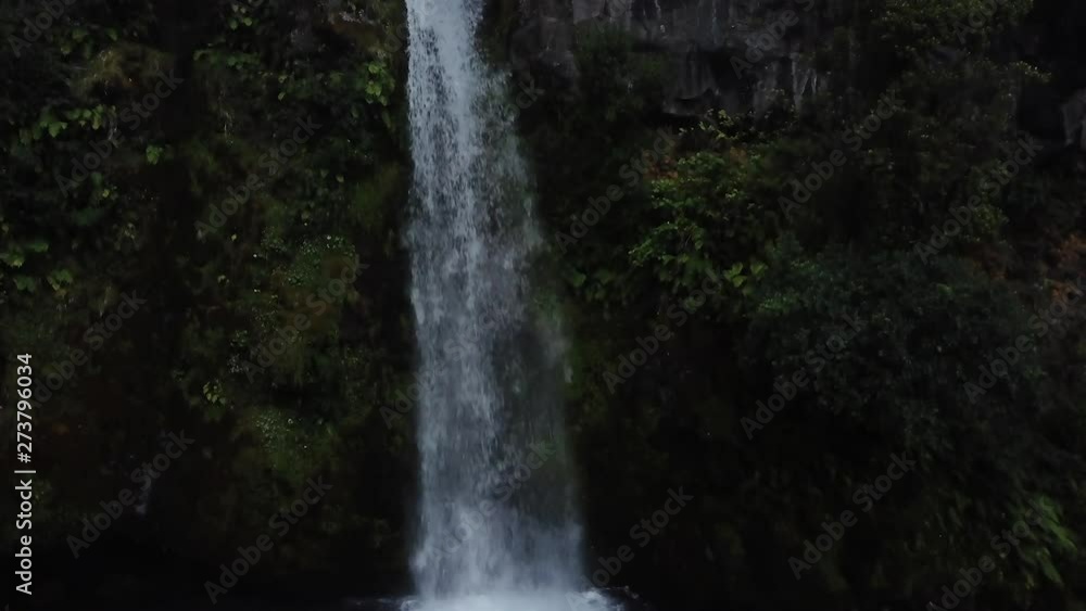 New Zealand Drone shot of waterfall, motion follows water from top to bottom New Zealand Drone shot of waterfall, motion follows water from top to bottom