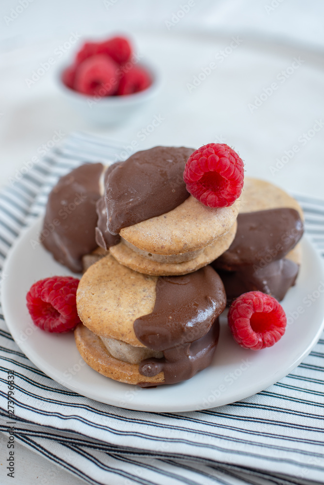 Sweet delicious ice cream cookie sandwiches on table