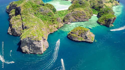 Fotografie, Obraz Aerial drone view of tropical Ko Phi Phi island, beaches and boats in blue clear