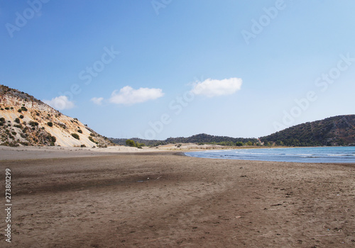 Seashore in Turkey. Summer beach with stones in the bay of the ocean.