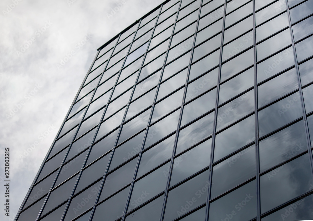 dark clouds and the sky in a glass building photo dark clouds and the sky in a glass building photo