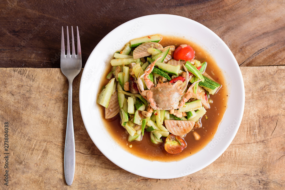 Spicy cucumber salad with steamed pork sausage, Thai food Spicy cucumber salad with steamed pork sausage, Thai food